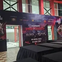 Event stage area with black skirt tables