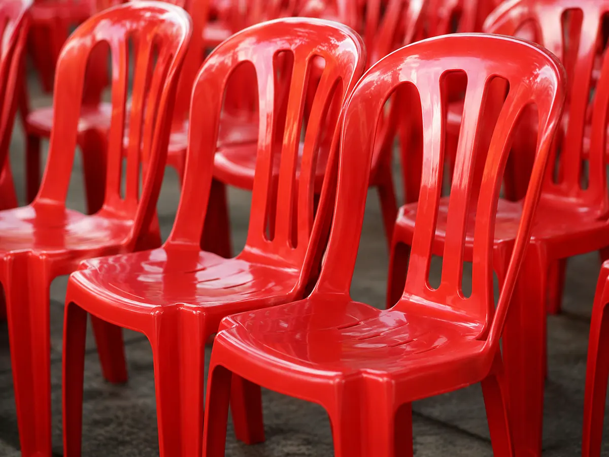 Red plastic chair closeup for event seating