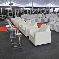 White sofa lounge setup for event guests